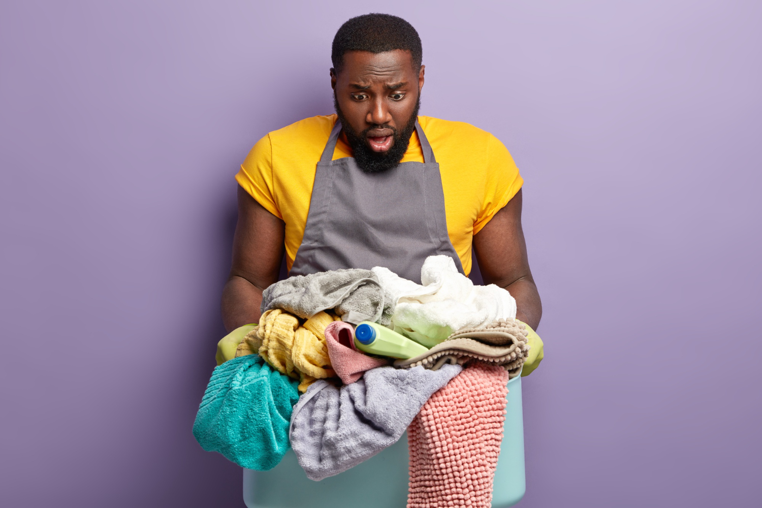 African American man doing laundry